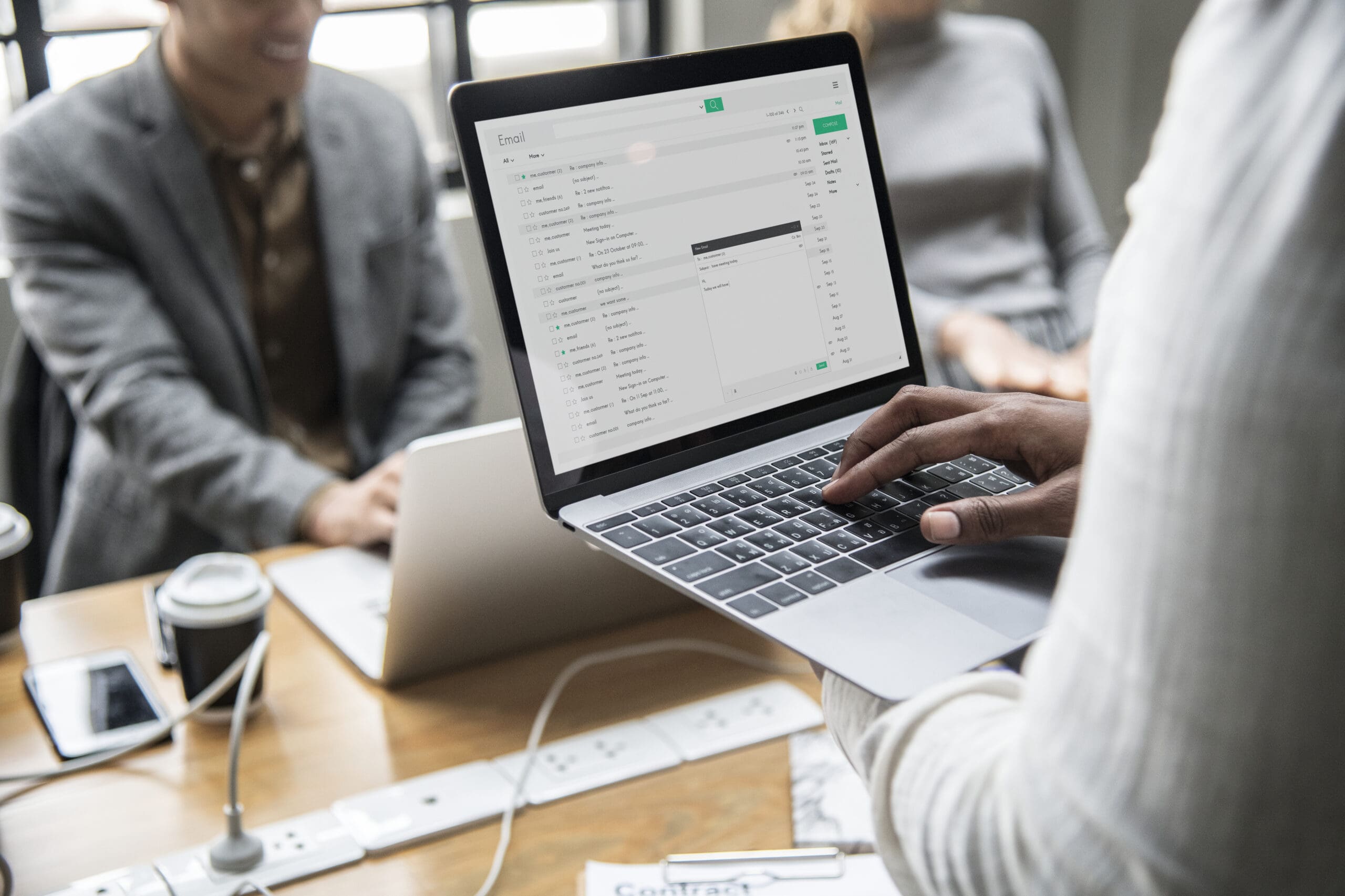 Man Checking His Email On A Laptop